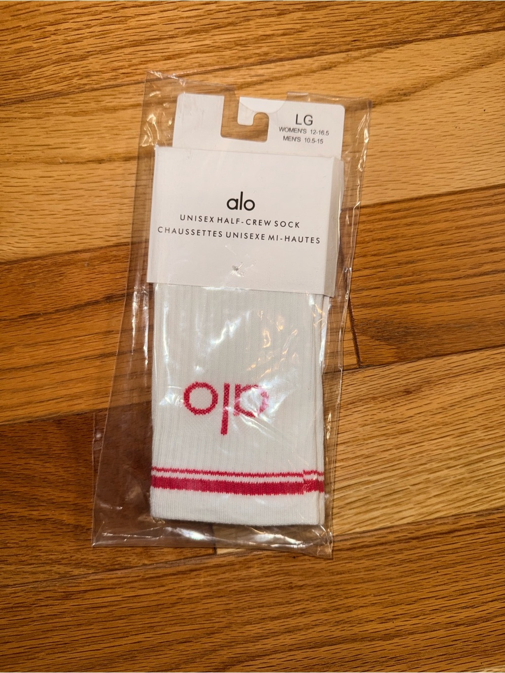 ALO Yoga White Crew Socks with pink Stripe and Logo